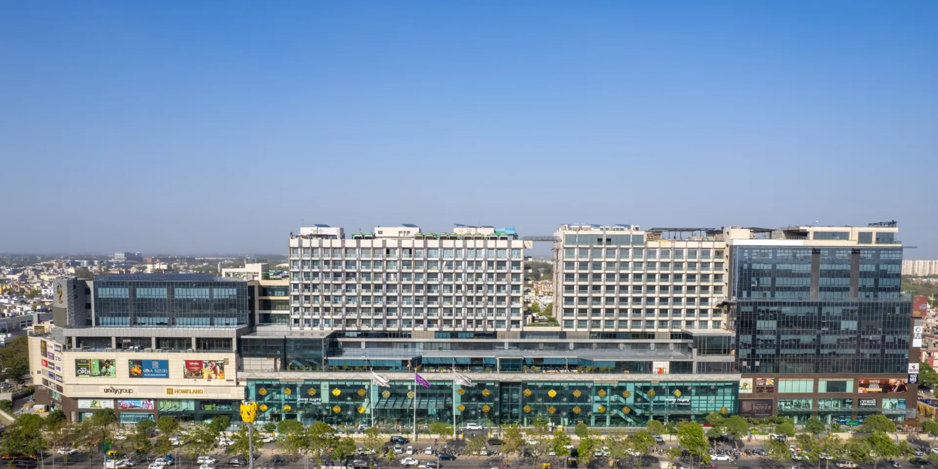 Aerial view of CP67 Mohali retail mall, corporate towers and glass atrium on Airport Road, Sector 67
